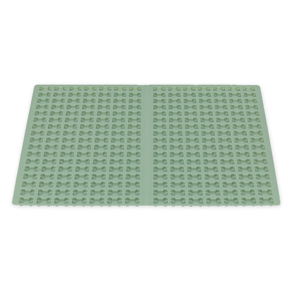 Trixie Backmatte (2cm Knochenform Grün) aus flexiblem Silikon mit vielen kleinen Knochenformen – ideal zur Herstellung von Hundeleckerlis oder Smoothie-Snacks für Hunde.