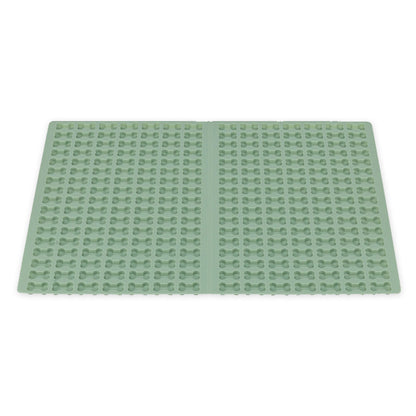 Trixie Backmatte (2cm Knochenform Grün) aus flexiblem Silikon mit vielen kleinen Knochenformen – ideal zur Herstellung von Hundeleckerlis oder Smoothie-Snacks für Hunde.