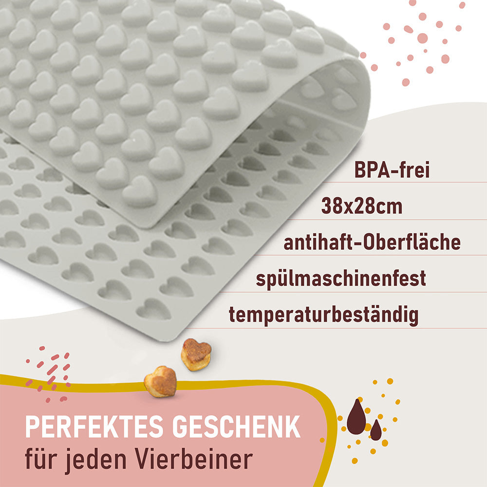 Graufarbene Silikon-Backmatte in 1.2cm Herzform Grau mit kleinen herzförmigen Mulden – BPA-frei, spülmaschinenfest, antihaftend und temperaturbeständig. Aus hochwertigem, elastischem und strapazierfähigem Silikon für die einfache Herstellung von Hundeleckerlis.