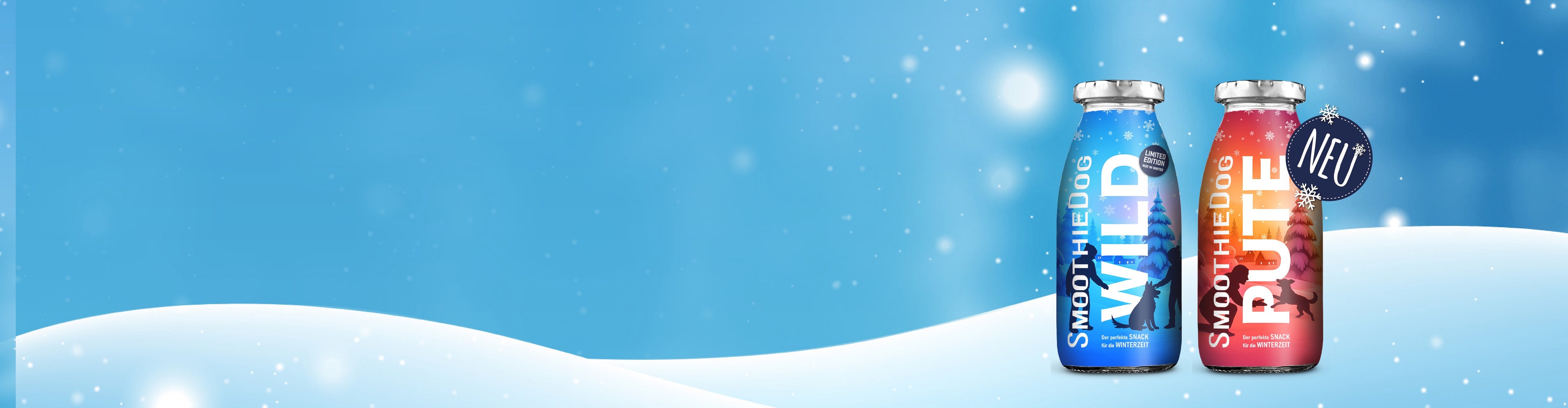 Breiter Winterbanner mit den SmoothieDog Winter-Editionen Wild und Pute vor verschneitem Hintergrund.