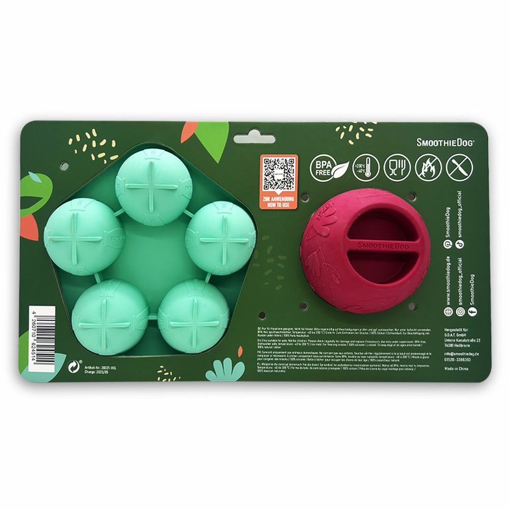 Rückseite des SmoothieDog Schleckball-Sets: Das Bild zeigt die grüne Silikonform mit fünf abgedeckten Mulden und den roten Schleckball, beide auf der Rückseite der Verpackungskarte. Verschiedene Symbole weisen auf Eigenschaften wie BPA-frei, Spülmaschinenfestigkeit und die Verwendung von Naturkautschuk hin.