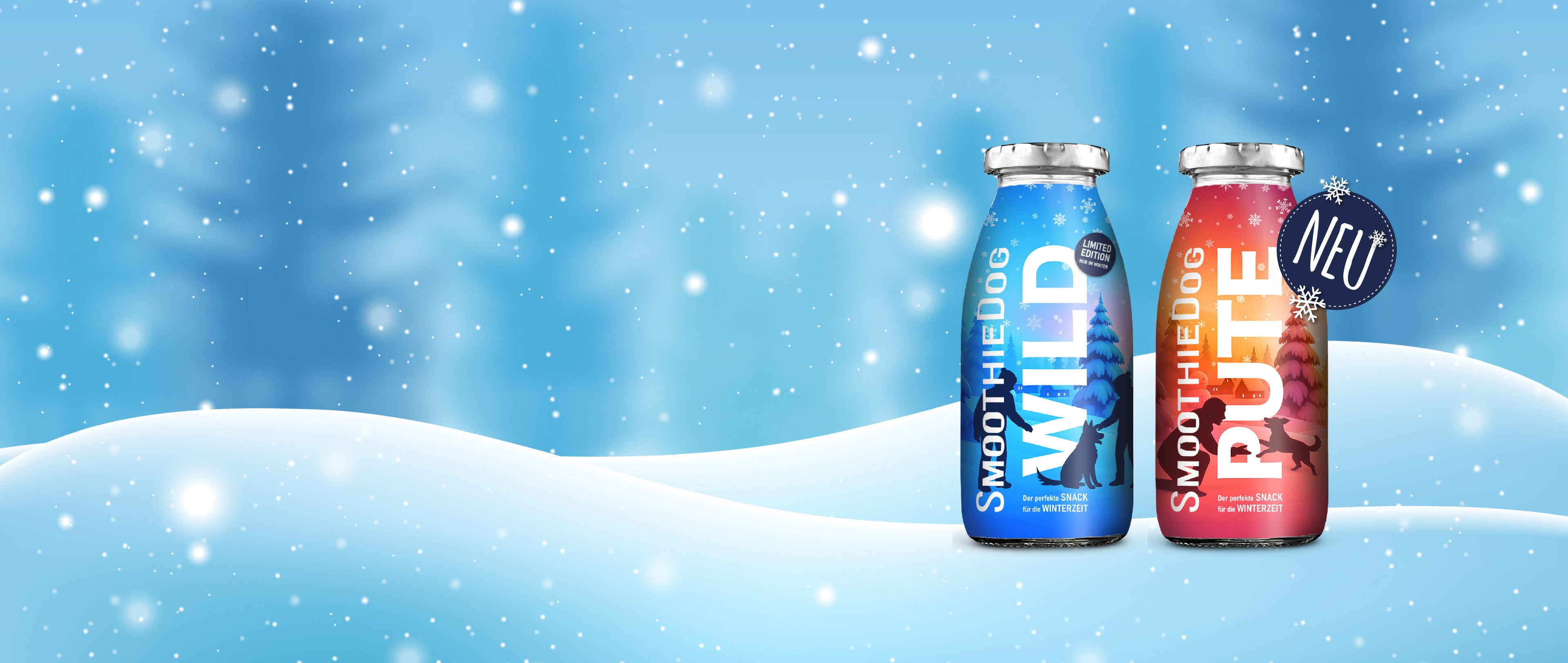 Breiter Winterbanner mit den SmoothieDog Winter-Editionen Wild und Pute vor verschneitem Hintergrund.